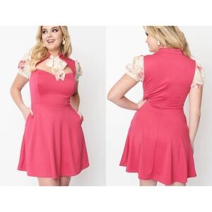 Unique Vintage Pink Dress with Floral Accents